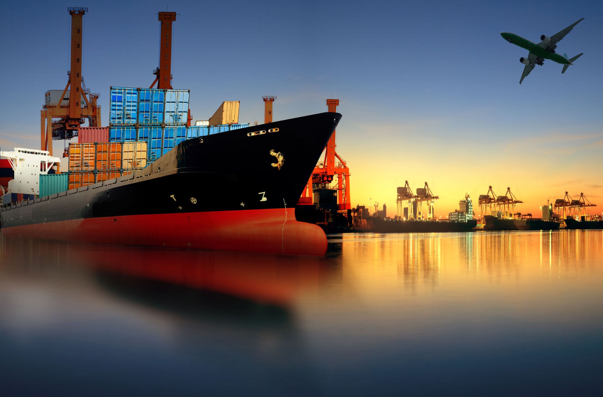 container ship in import,export port against beautiful morning l